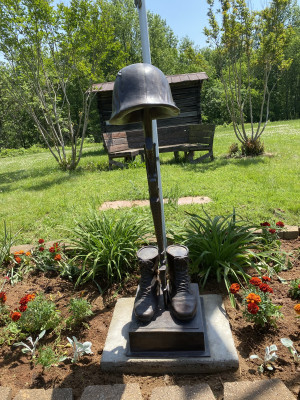 Whippoorwill Academy Memorial Day statue with new plants