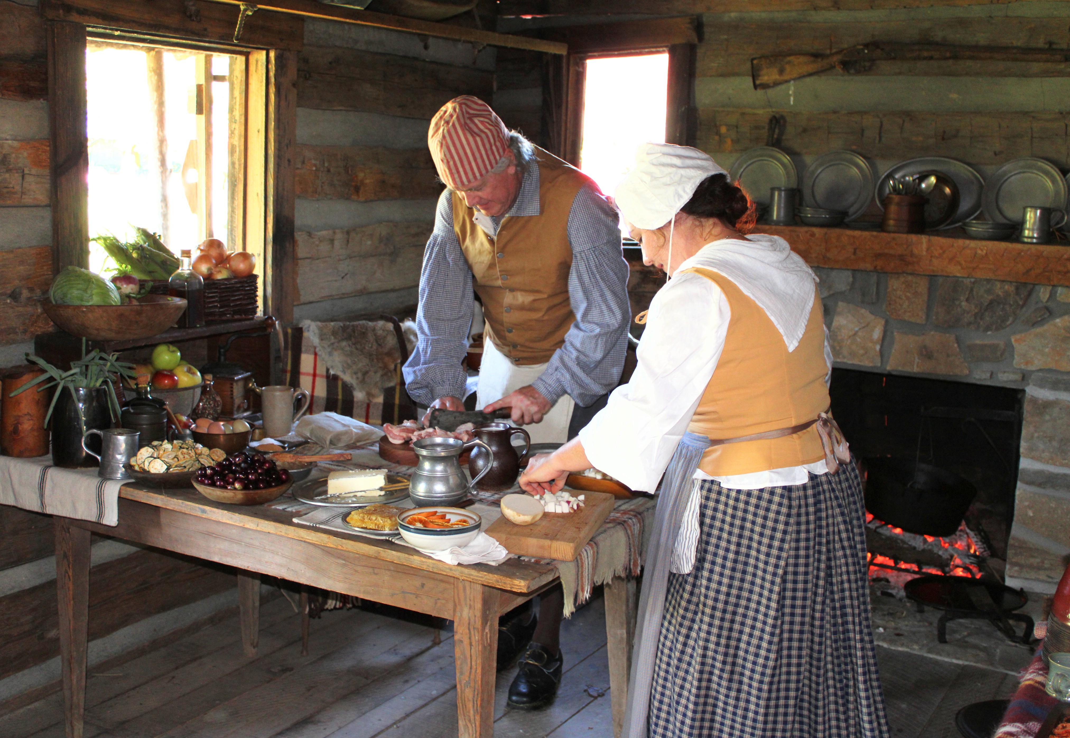 Doug-Mitchell-and-daughter-cooking-in-the-D-Boone-cabin